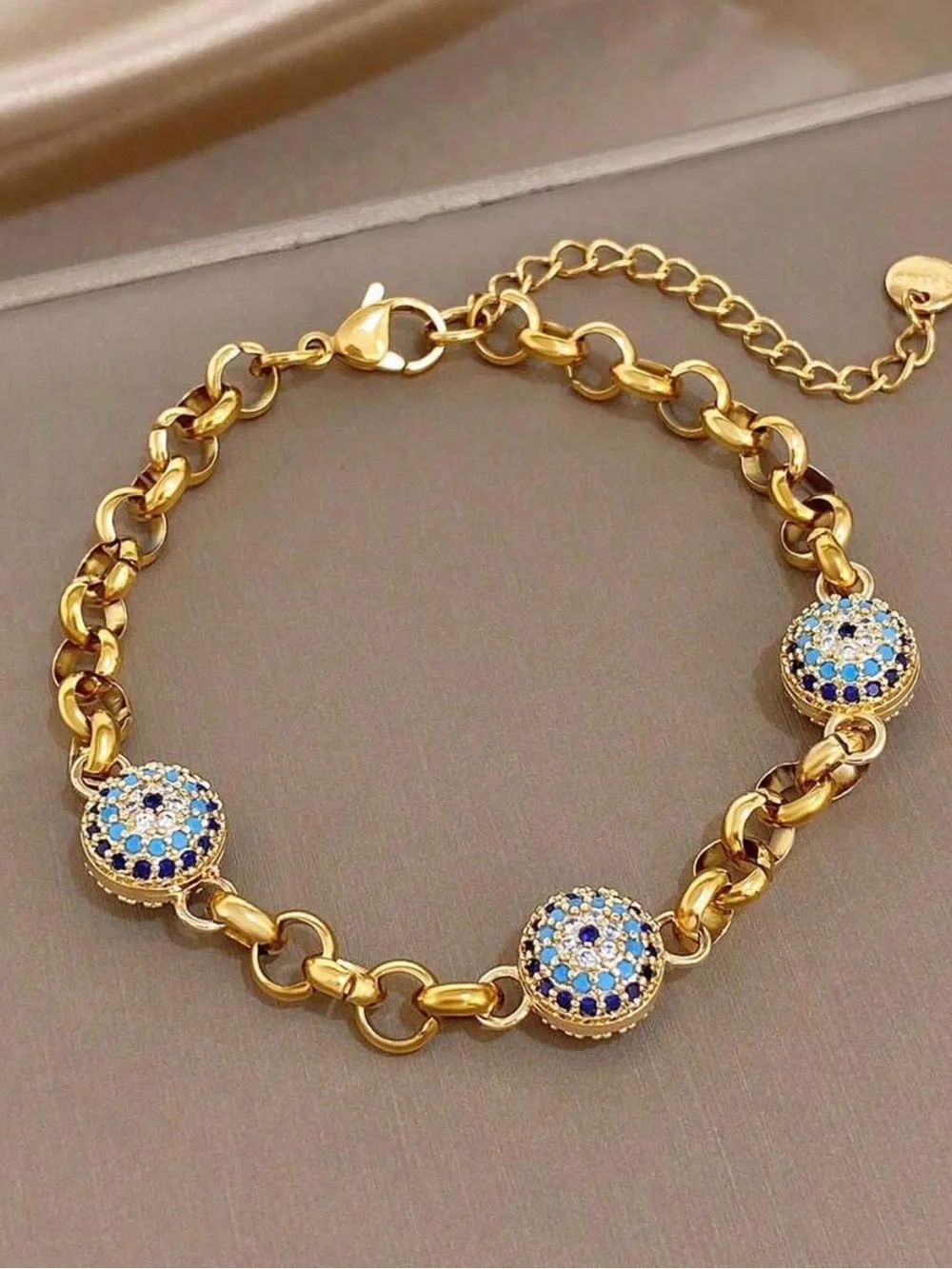 Gold-Tone Bracelet with Blue and White Crystal Discs